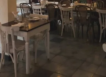Bistro tables and the open kitchen